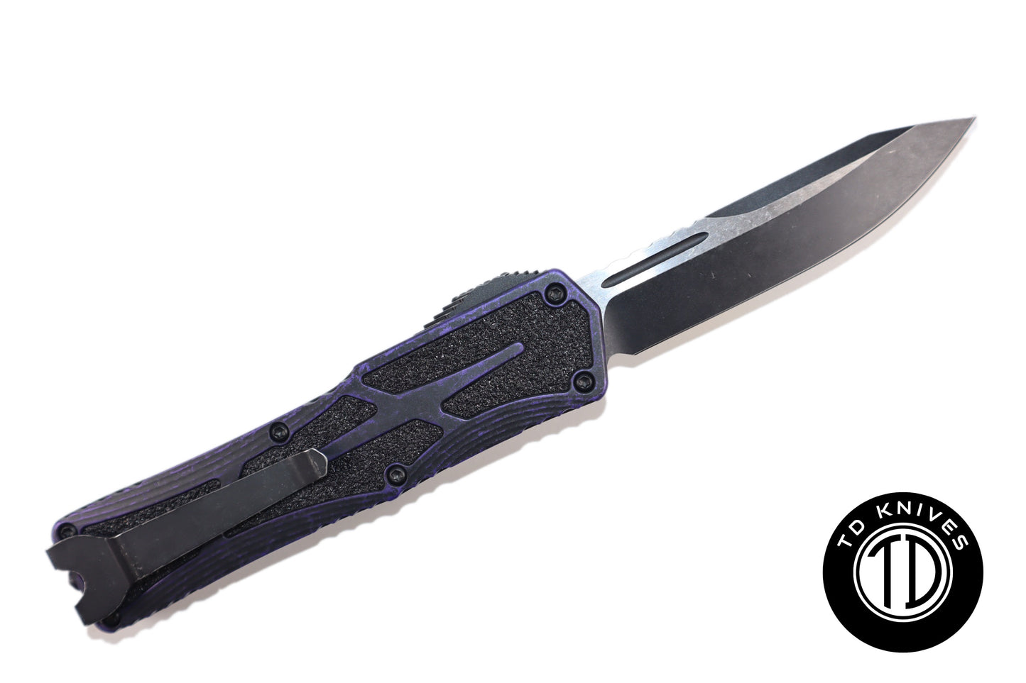 HERETIC - Colossus in Breakthrough Purple W/ Single Edge Two Tone Battle Black Magnacut Blade Finish. Model # H039-14A-BRKPU