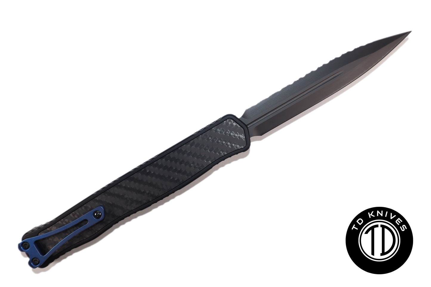 HERETIC - Cleric II in Black Chassis W/ Carbon Fiber inlay - Full Serrated Double Edge DLC Finish Blade, Blue Ti Button and Blue Ti Clip Model # H020-6C-CF/BLU