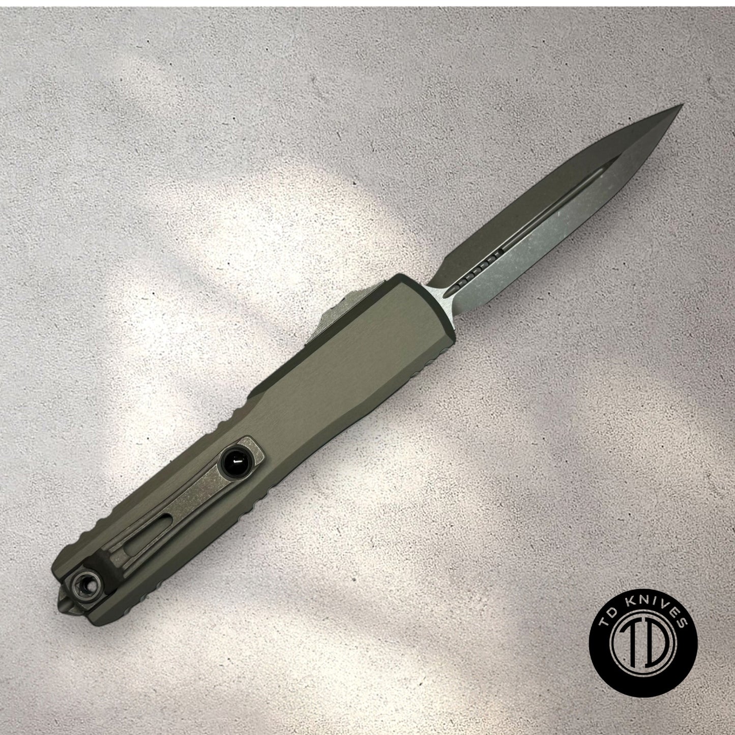 MICROTECH - Ultratech Gen III ZBP Double Edge in Natural Clear W/ Apocalyptic Blade Finish Model # 1122-10 APNC