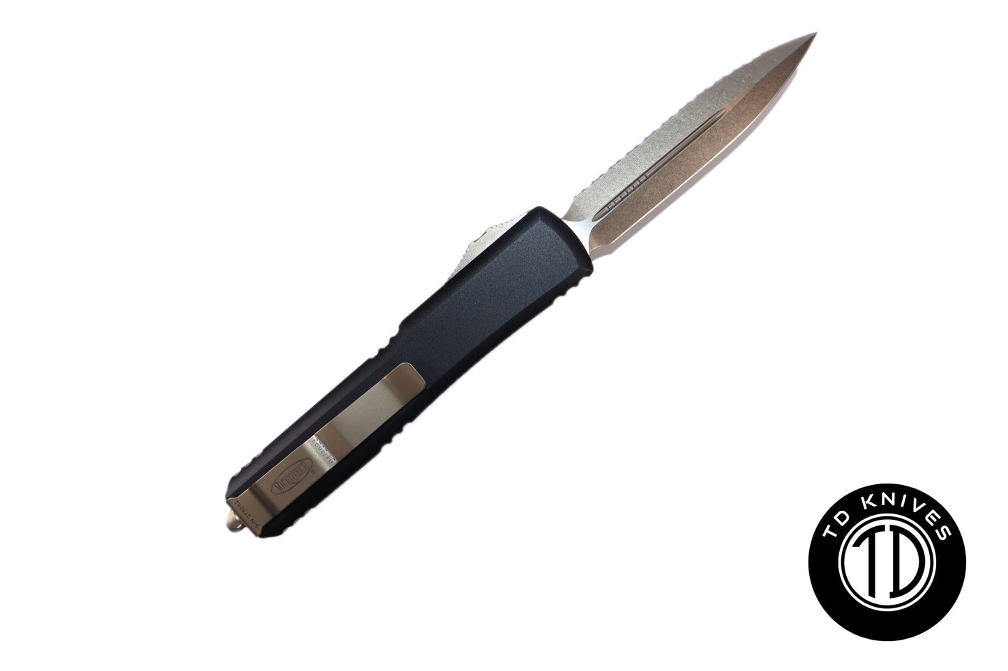 MICROTECH - Ultratech Fully Serrated Double Edge in Black with Bronze Blade and Hardware. Model # 122-15