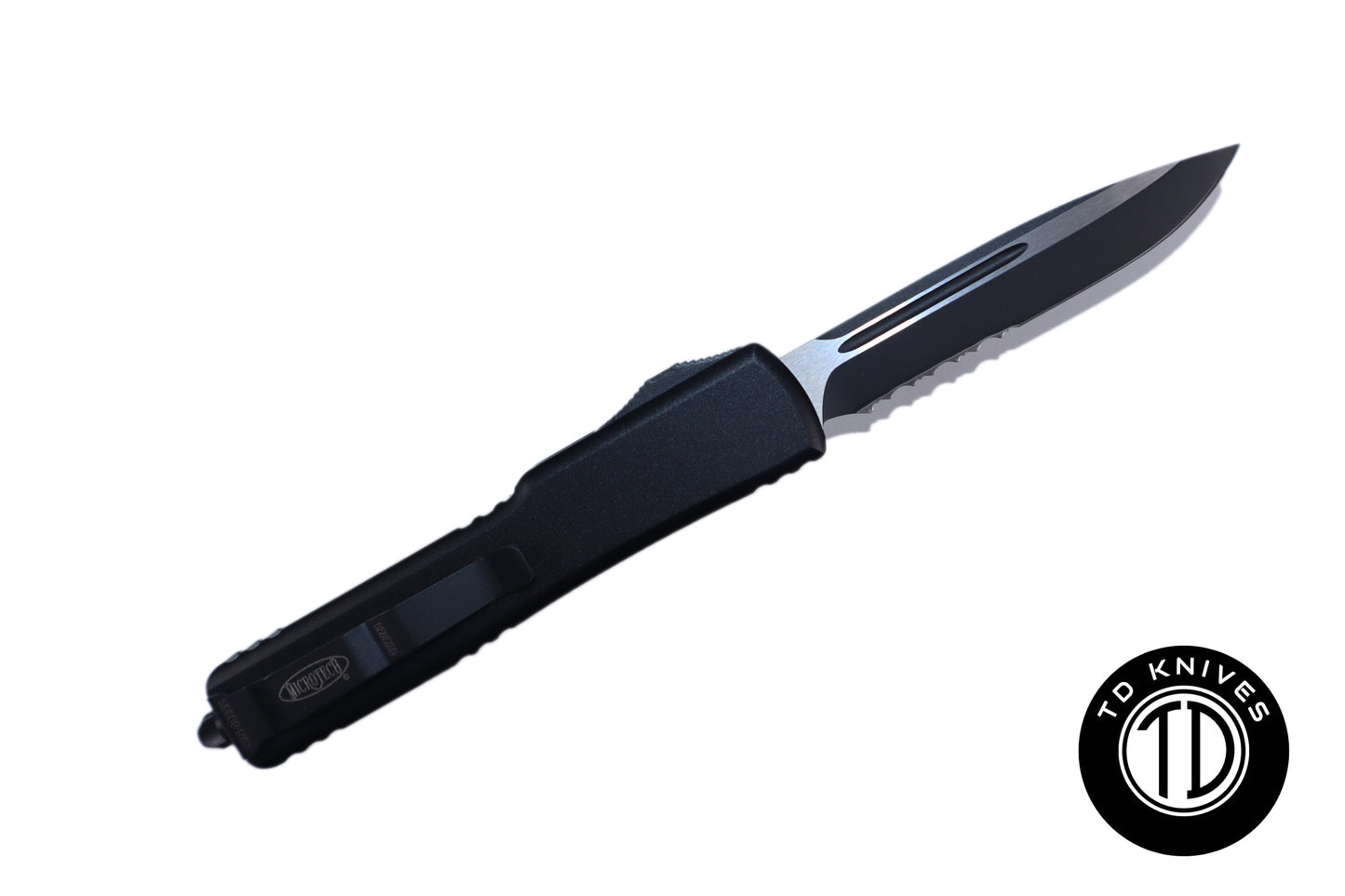 MICROTECH - UTX-70 Partial Serrated Standard Edge in Tactical Black with Black Blade Finish. Model # 148-2T