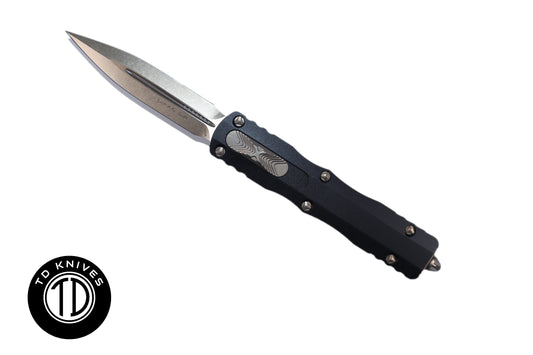 MICROTECH - Dirac Double Edge in Black with Bronze Blade and Hardware. Model # 225-13