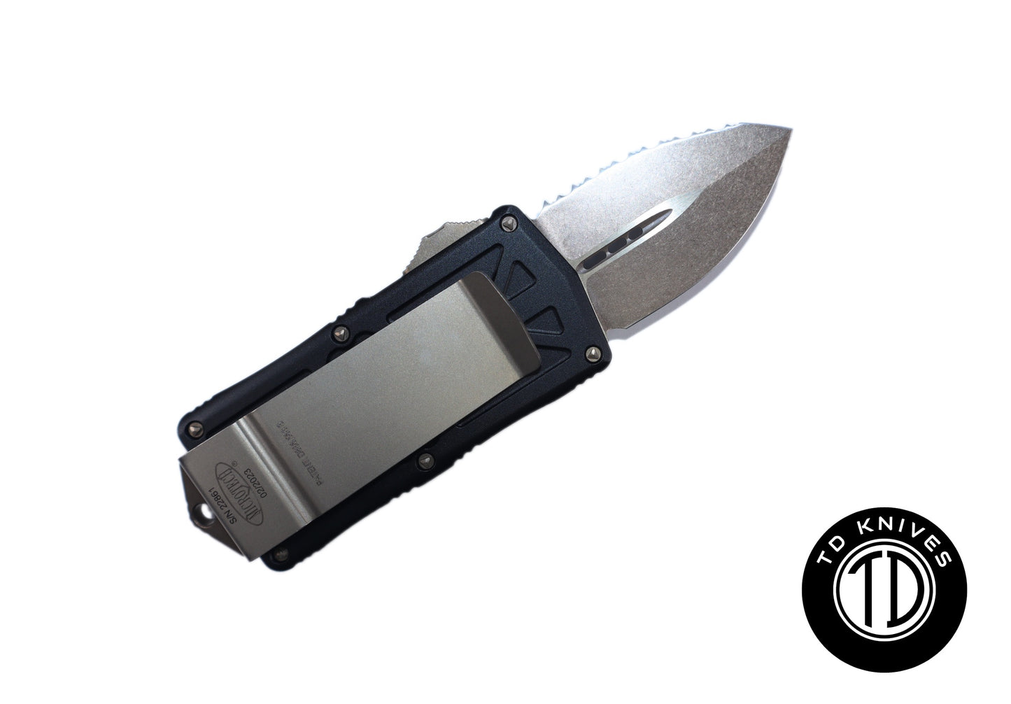 MICROTECH - Exocet Fully Serrated Double Edge in Black with Bronze Blade Finish. Model # 157-15