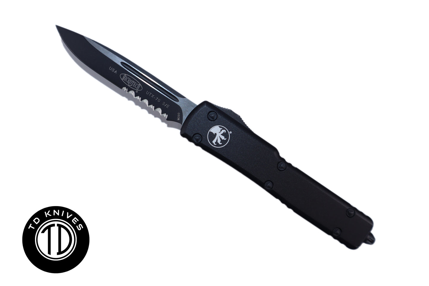 MICROTECH - UTX-70 Partial Serrated Standard Edge in Tactical Black with Black Blade Finish. Model # 148-2T