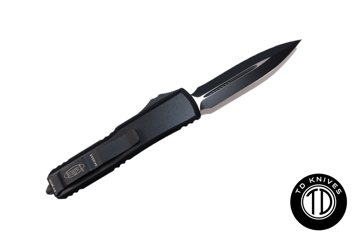 MICROTECH - UTX-85 Fully Serrated Double Edge in Tactical Black with Black Blade Finish. Model # 232-3T